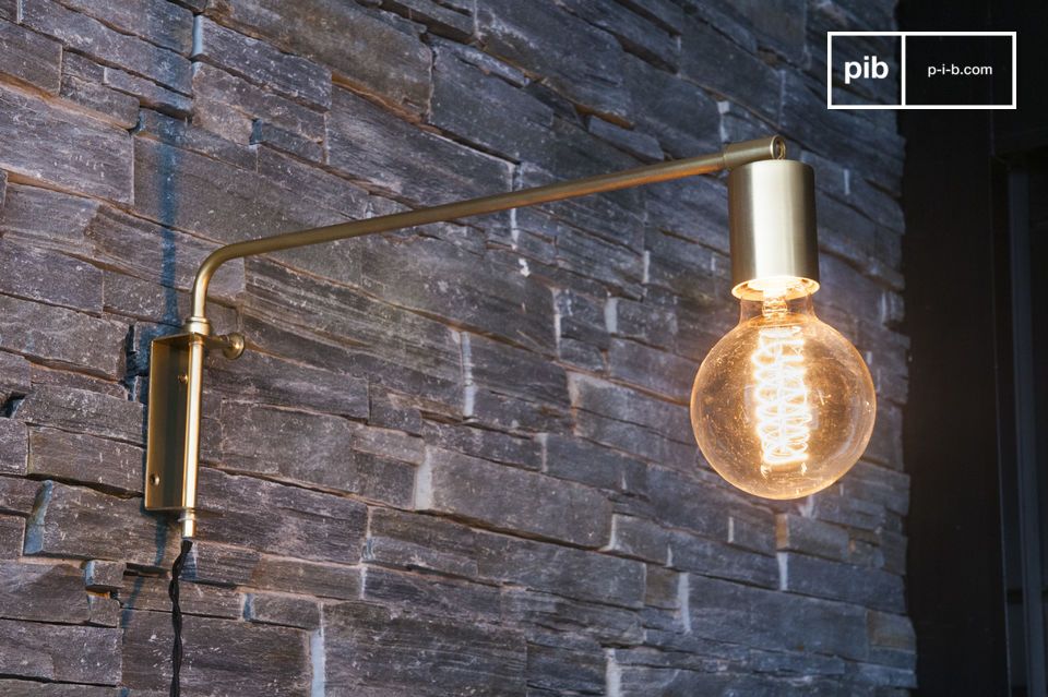 Nice golden wall lamp with exposed bulb.