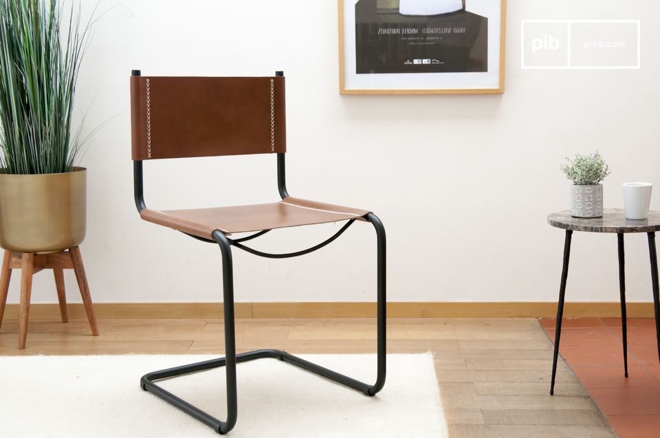 Pretty iconic design chair in brown leather and matt black metal.