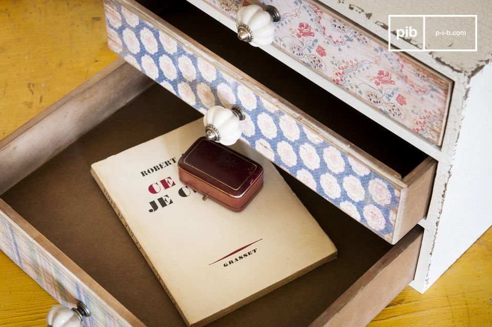 This small piece of furniture has three different drawers