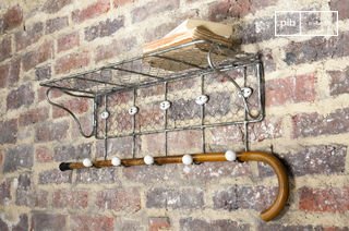 Wire mesh shelf with numbered hooks