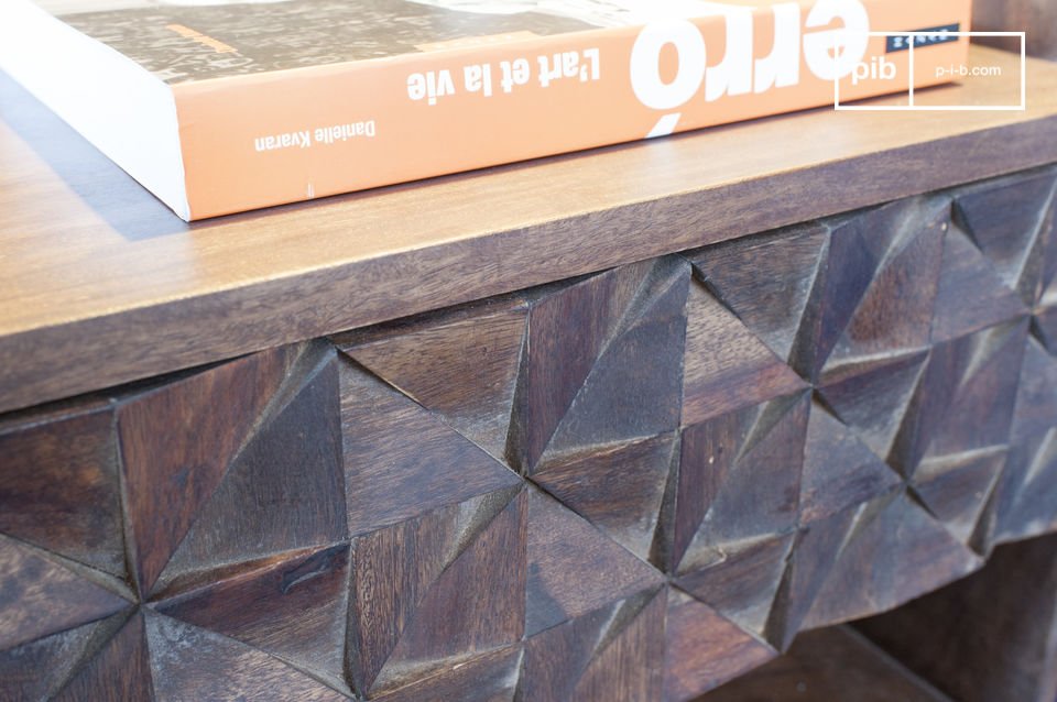 The drawer is made of hand-assembled wooden triangles.