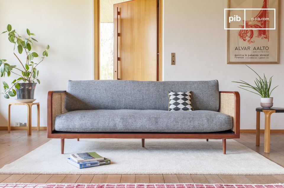 Wooden sofa and cane with a structure inspired by the 1920s.