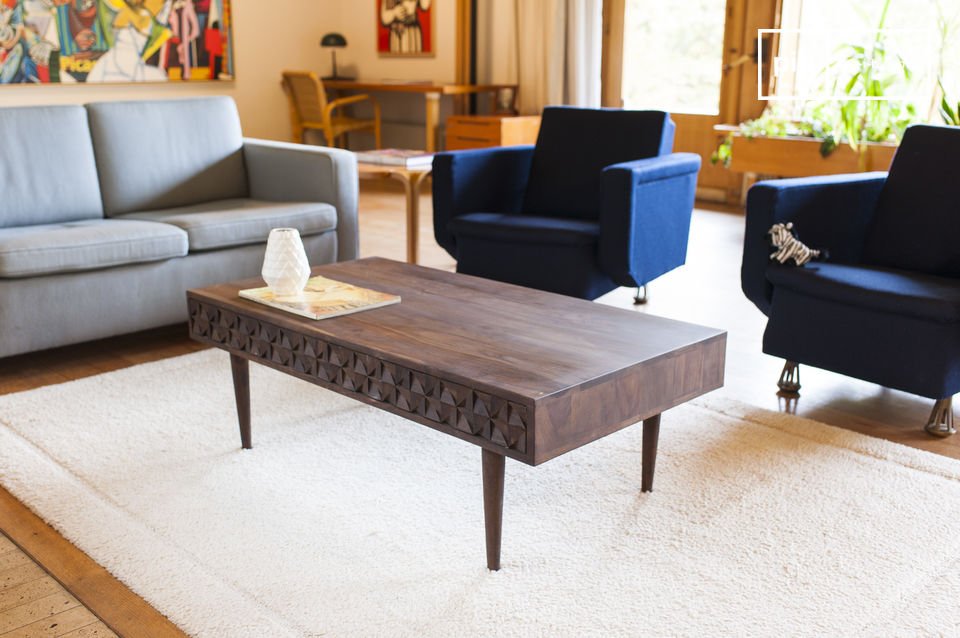 Superb dark wooden table with geometric patterns.