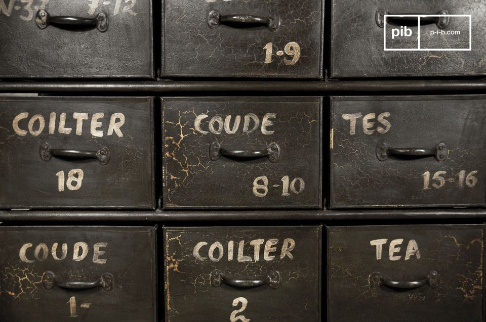 A piece of furniture from a ancient workshop, with its superb dark green patina and its 24 drawers